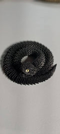 Articulated Snakes with Glass Eyes