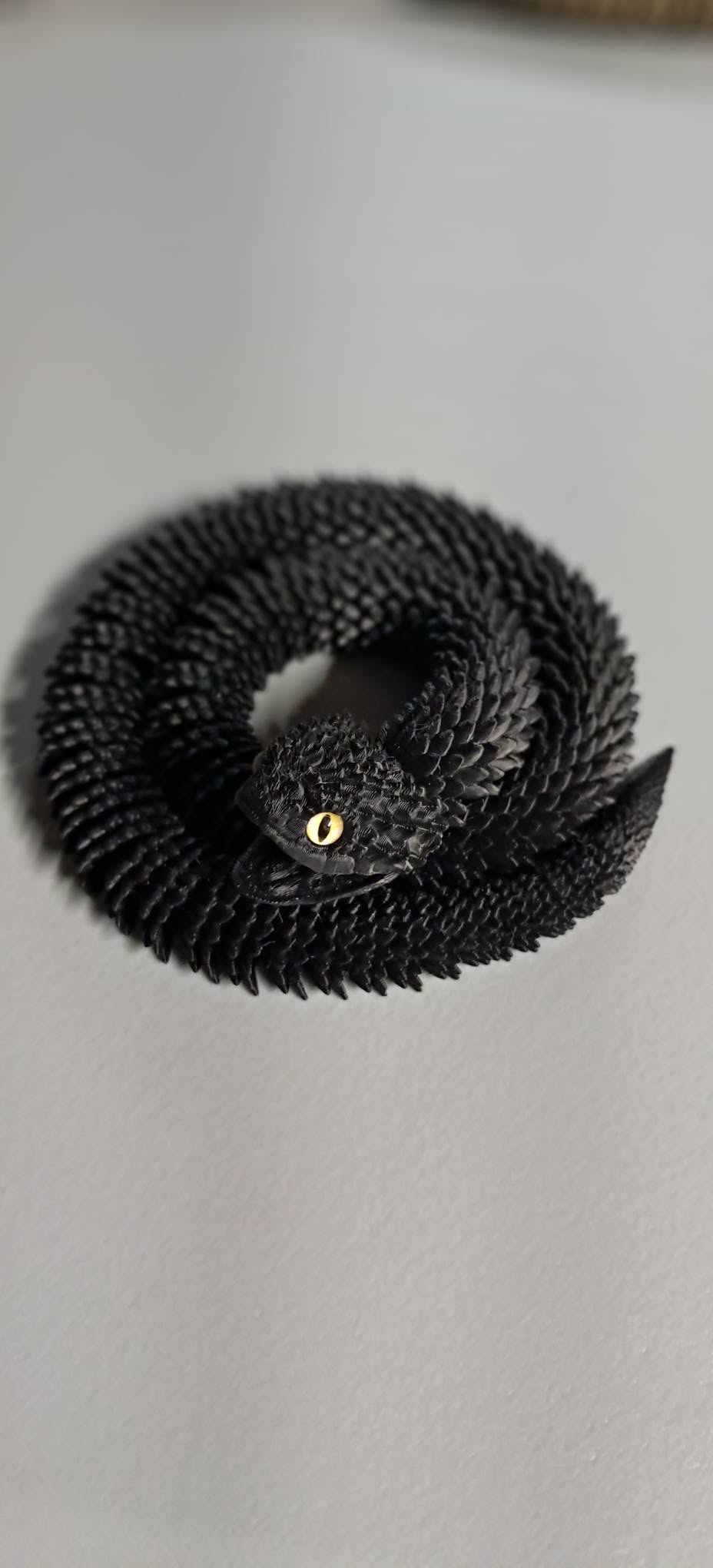 Articulated Snakes with Glass Eyes
