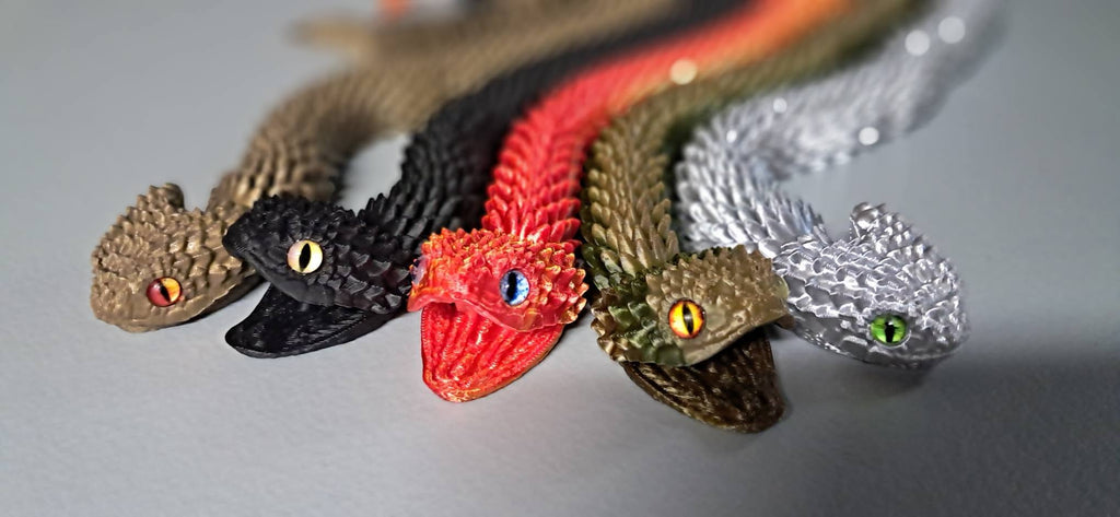 Articulated Snakes with Glass Eyes