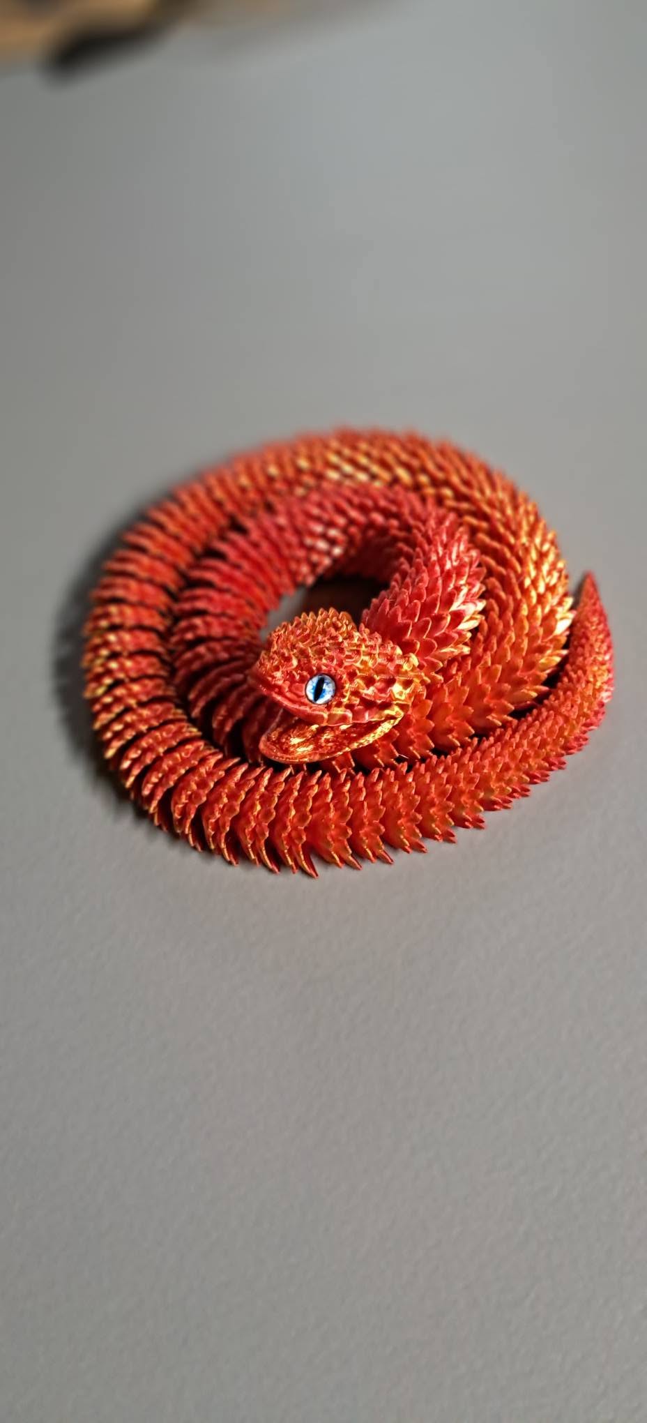 Articulated Snakes with Glass Eyes