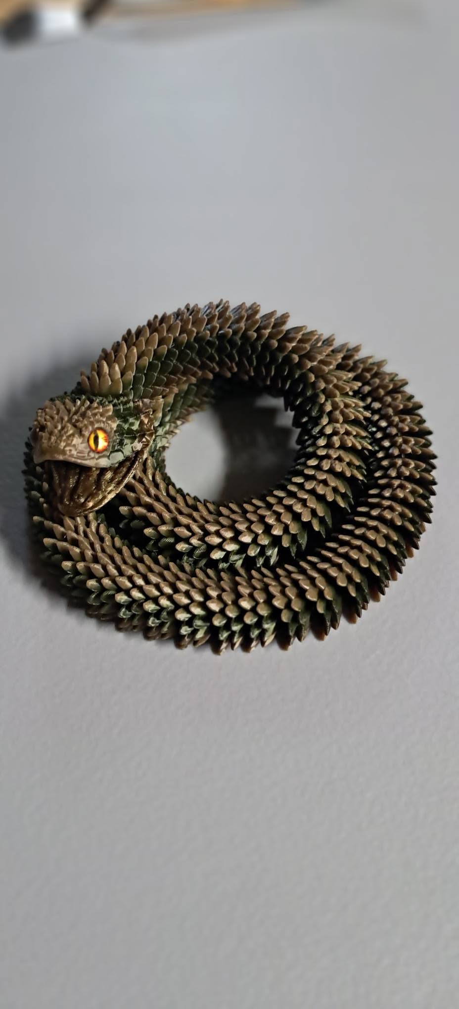 Articulated Snakes with Glass Eyes