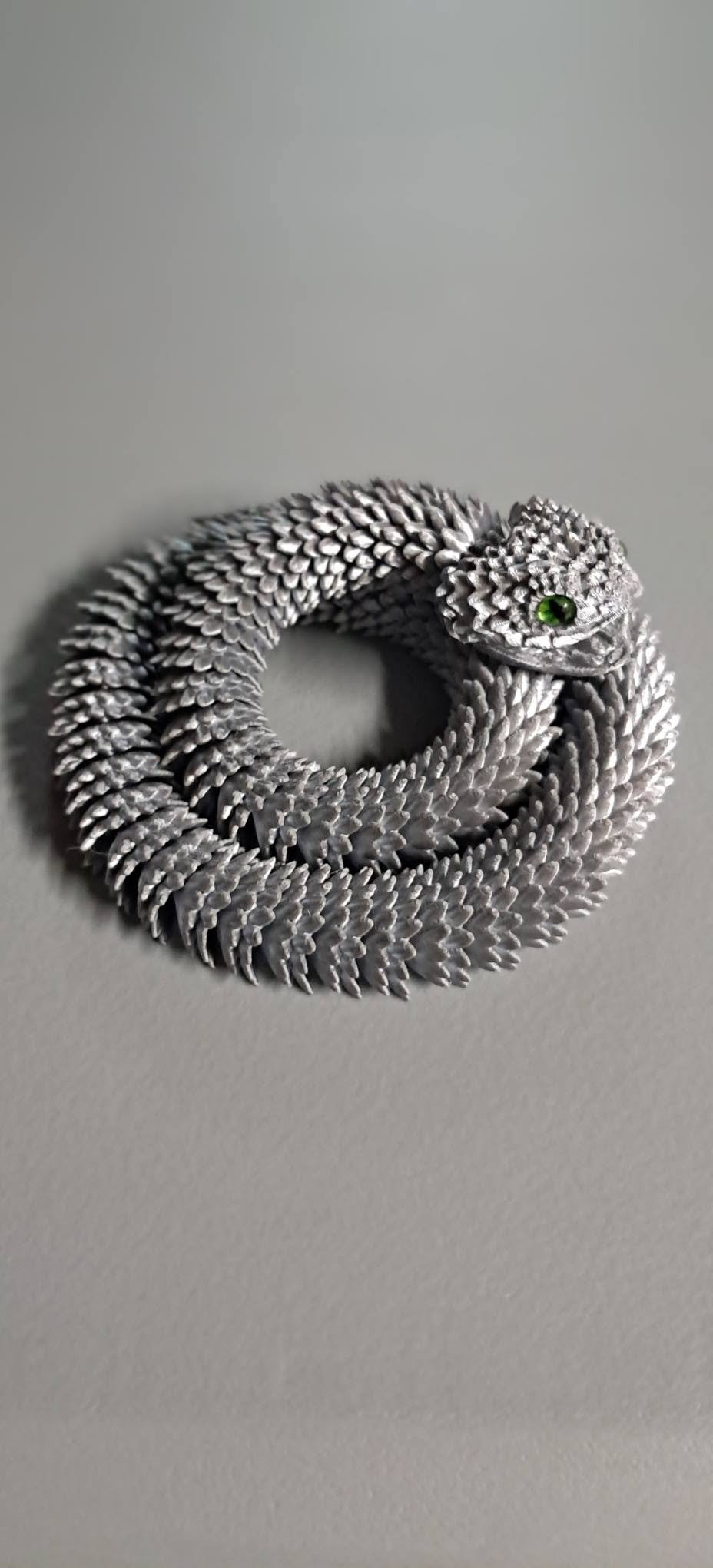 Articulated Snakes with Glass Eyes